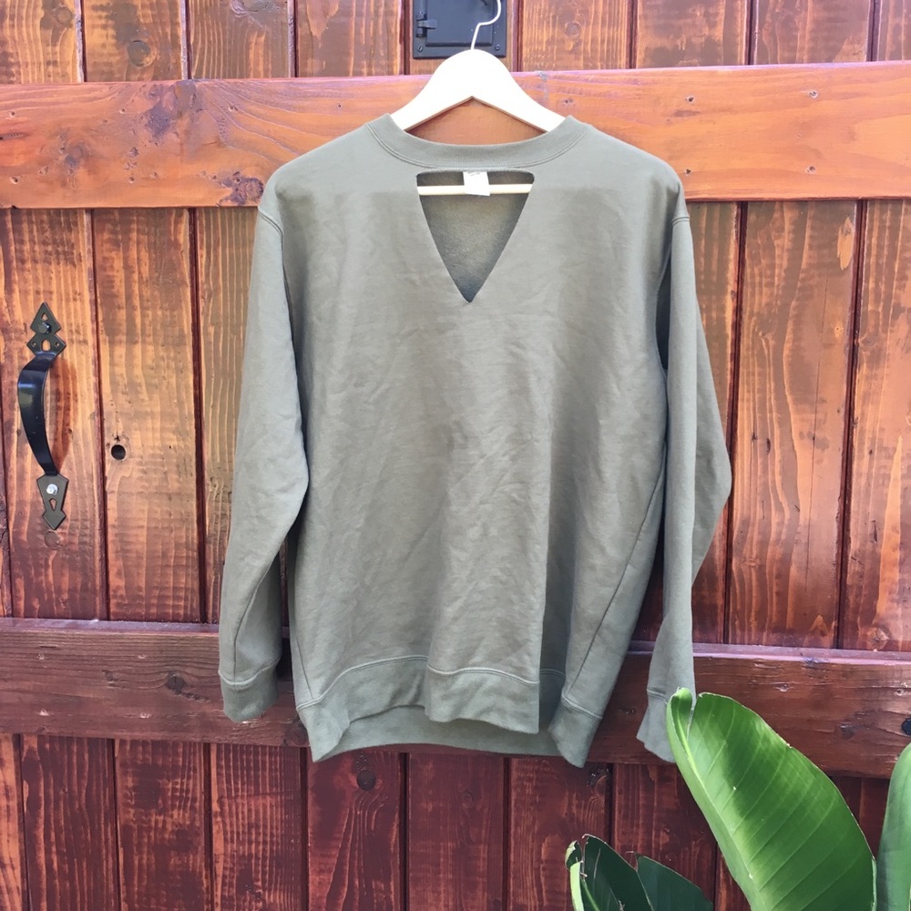 Olive green triangle cut out sweatshirt.